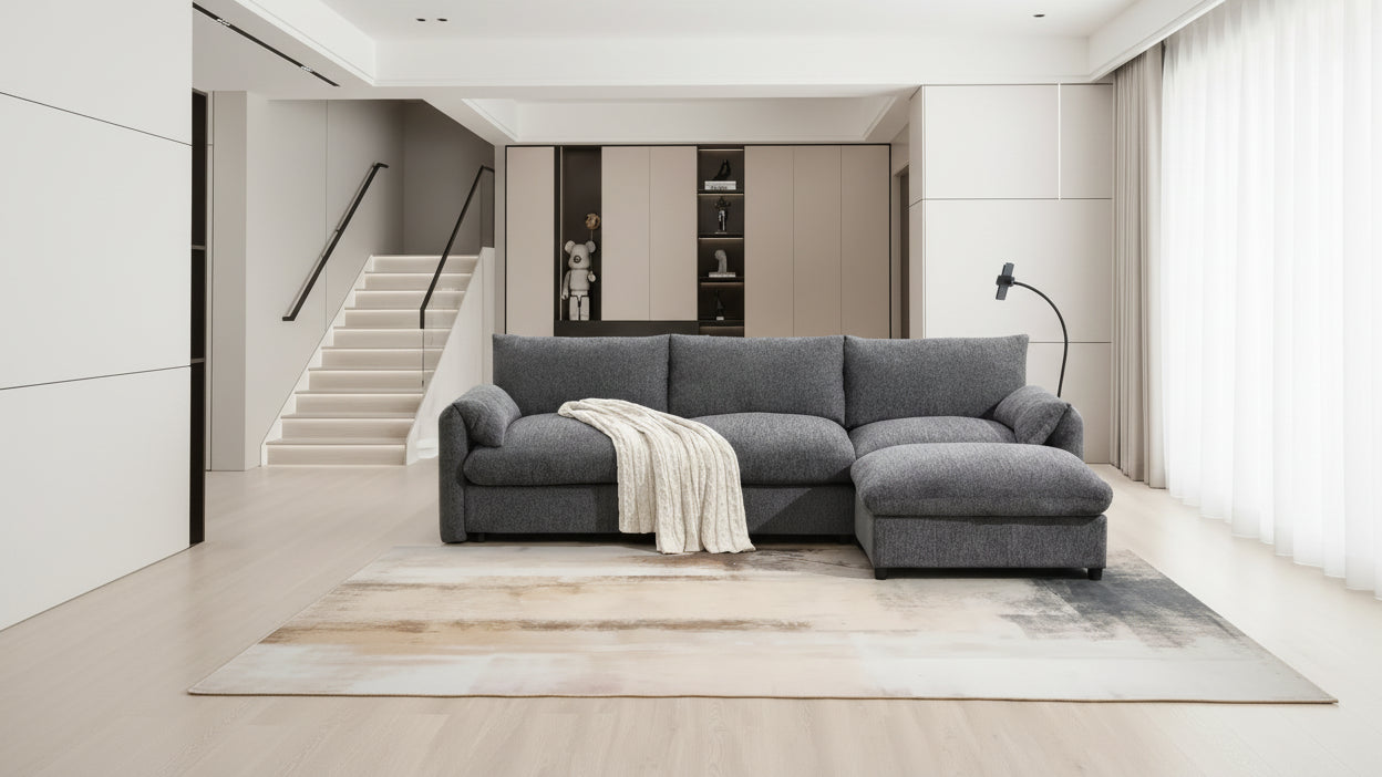 Divano componibile oversize in ciniglia con pouf contenitore e tasche, porta telefono regolabile e porte di ricarica
